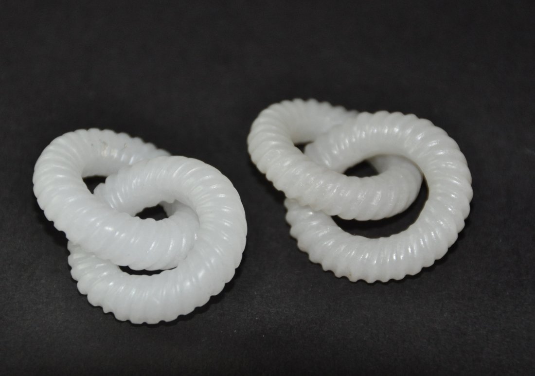 A pair of Qing period hetian white jade links (1 of 4)