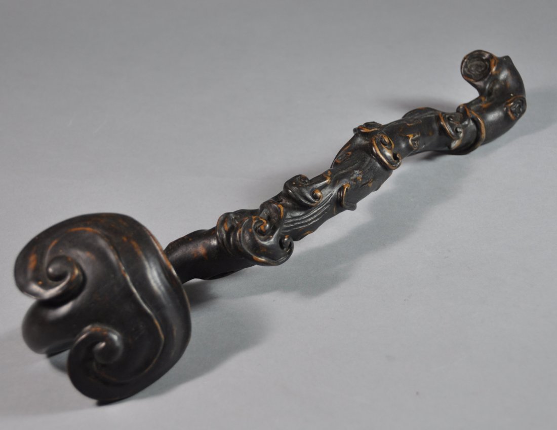 A Qing dynasty Zitan wood Ruyi Scepter (1 of 5)