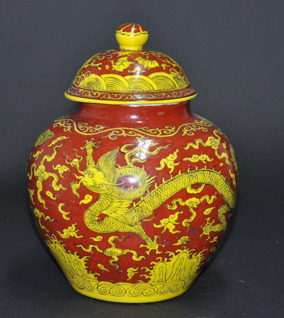 A Ming Jiajing red ground yellow dragon covered jar (1 of 7)