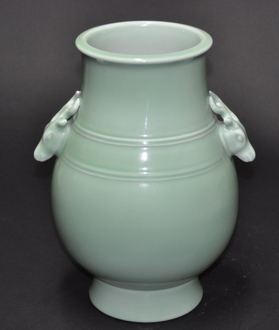 A Qing Qianlong pale green -ground hu vase (1 of 6)