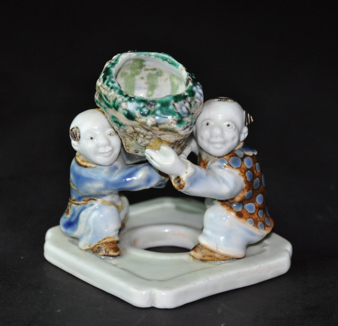 A Qing Enameled porcelain  figures boy (1 of 7)