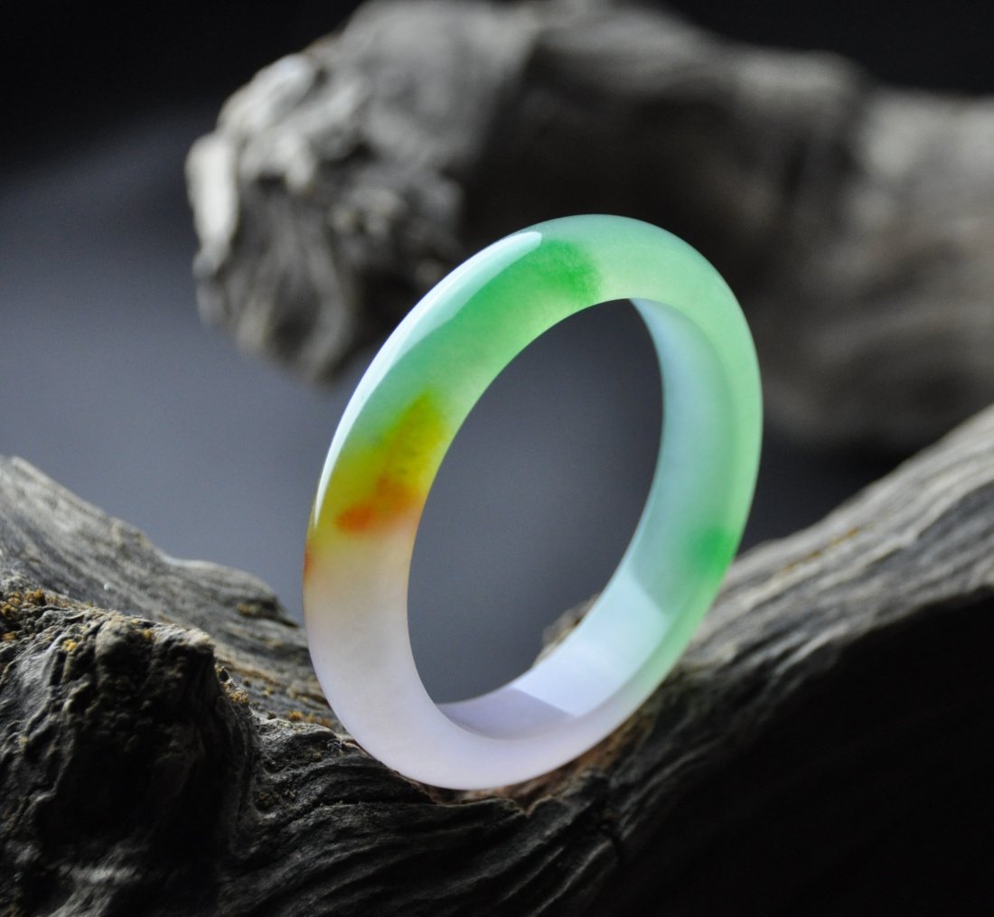 A translucent three color jadeite bangle (1 of 5)