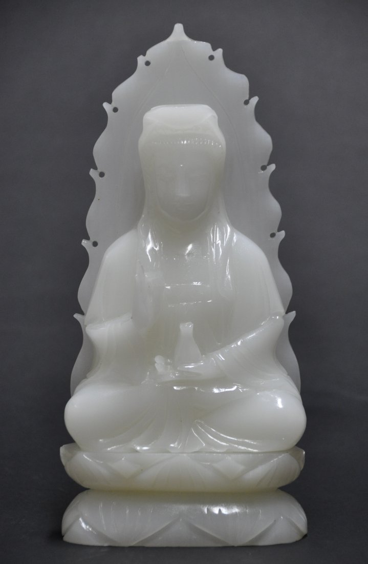 A white jade carving of Guanyin (1 of 8)