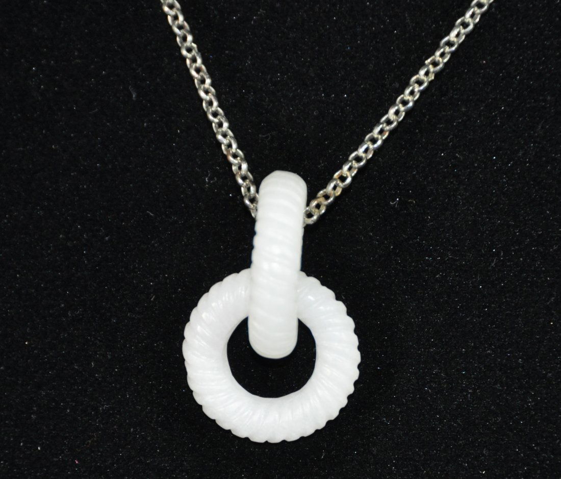 A pair of Qing period hetian white jade links (1 of 8)