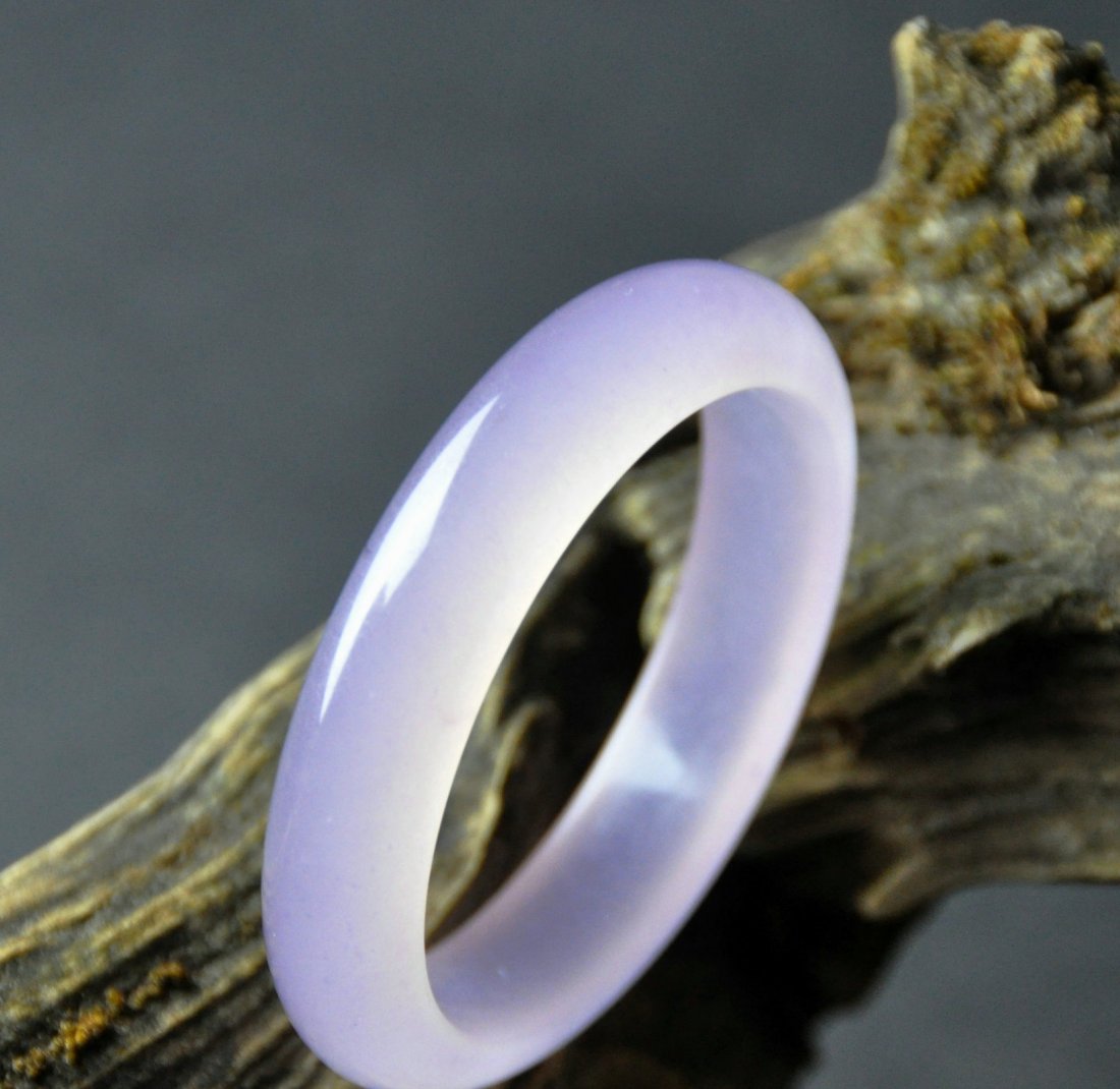 A translucent purple jadeite bangle (1 of 5)