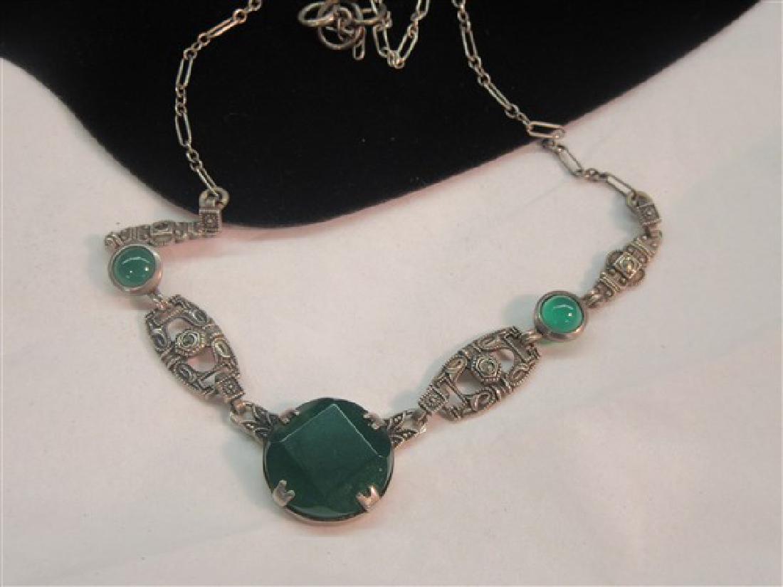 Art Deco Sterling Marcasite Necklace: An art deco sterling silver marcasite necklace with jade green colored stones. 8" drop.