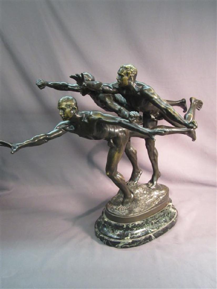 Alfred Boucher (French, 1850-1934) Bronze: Alfred Boucher (French, 1850- 1934) Untitled: "Au But" Bronze male group with great physique mounted on green marble base. Dimensions: 26 1/2" X 22" X 12" Signed A. Boucher Siot- Paris Foundry seal.