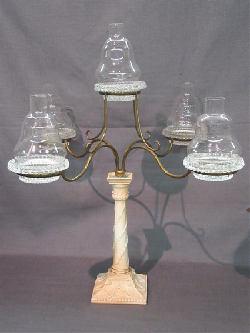 Clarke Cricklite Fairy Lamp Centerpiece: A Clarke's patent Cricklite fairy lamp centerpiece with lamps. Mounted onto a Royal Worcester porcelain candle stick. Dimensions: 17 1/2" X 15" , Lamps 6" X 4"