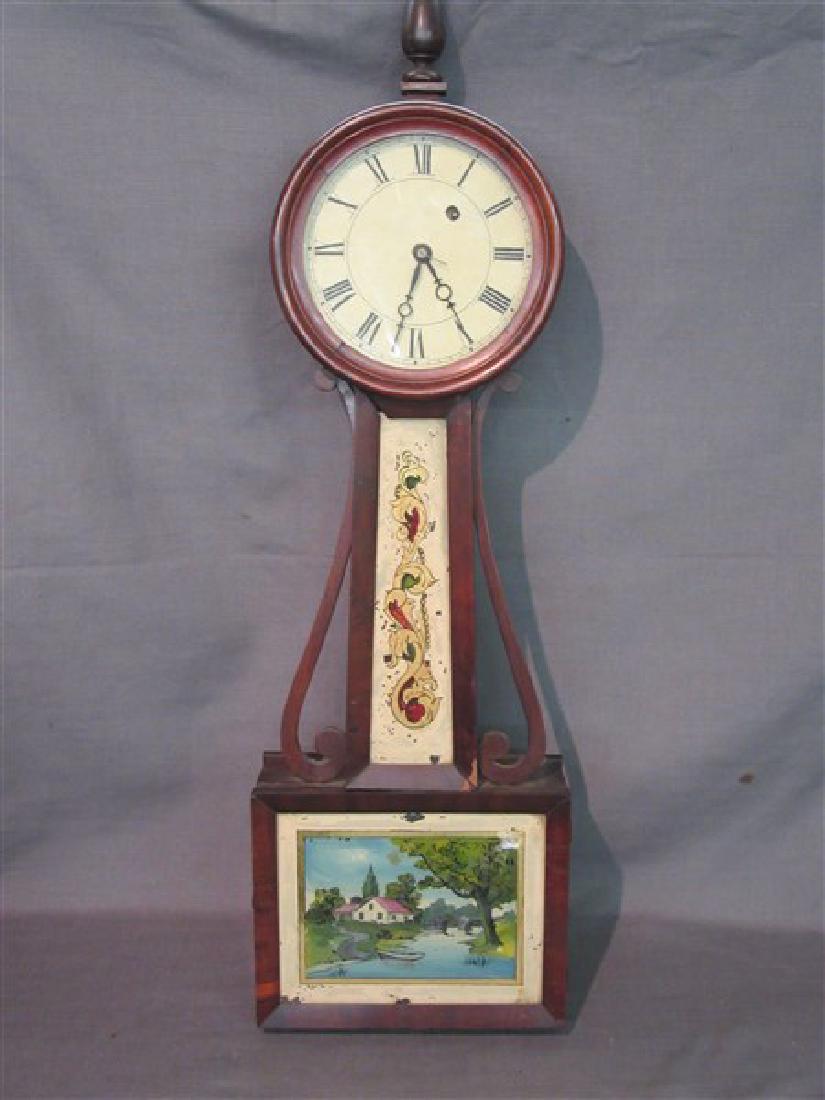 18th C. American Banjo Clock: An 18th century American banjo clock case. Replaced workings. Dimensions: 33" X 10"
