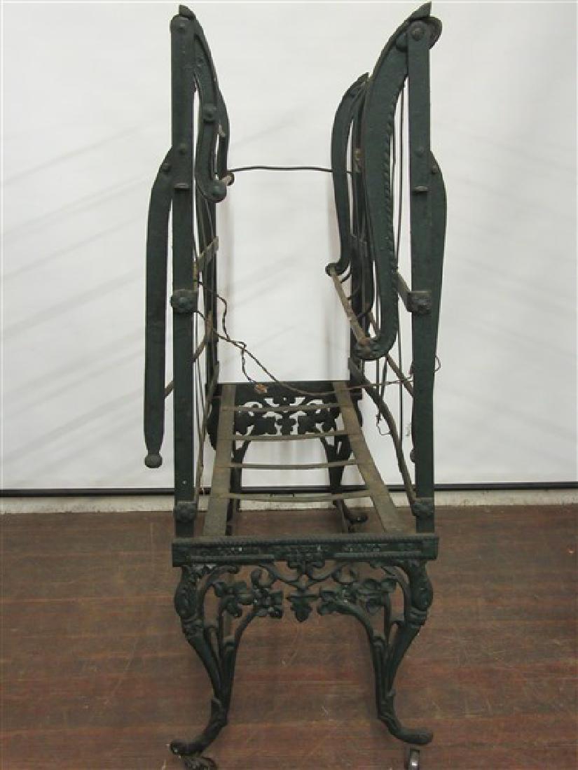 Colton's Patent Cast Iron Civil War Era Campaign Bed: A fancy cast iron folding campaign bed. Signed Colton's Patent 1859. Dimensions: 44" X 30" X 18"