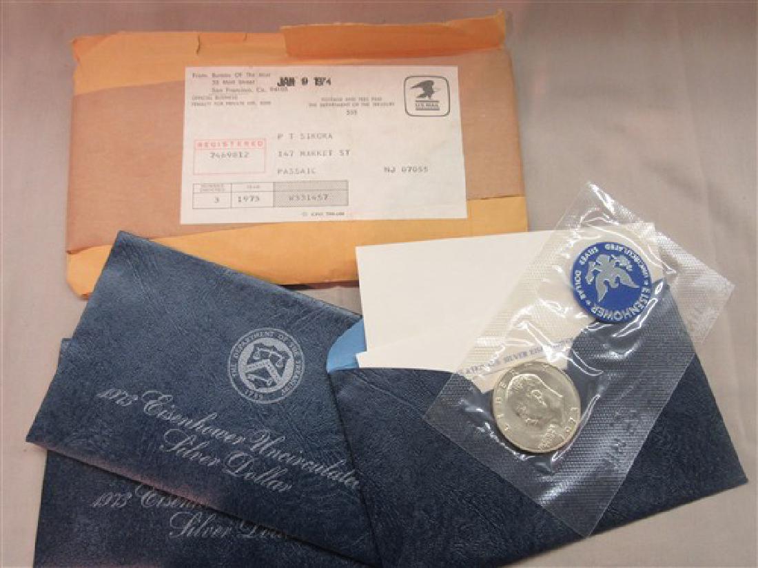 Three (3) Eisenhower 1973 Uncirculated Silver Dollars (1 of 1)