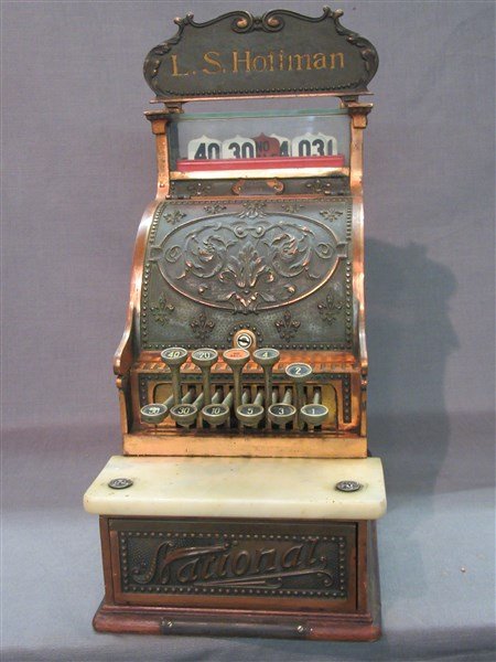 Antique National Candy Store Cash Register: A National 215 candy shop cash register. Excellent patina. All original. Serial no. 981945. Shop keeper sign affixed to top L.S. Hoffman. Dimensions: 21" X 16" X 9"