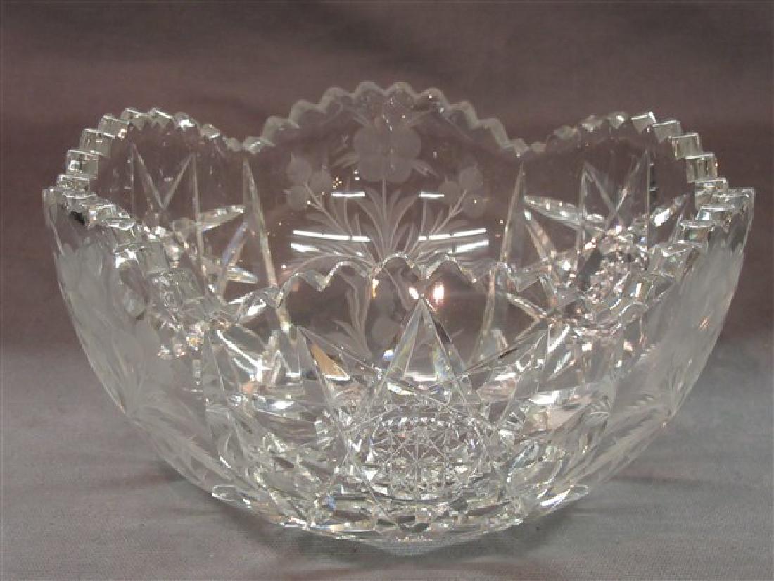 Tuthill ABCG Bowl: Tuthill American Brilliant Cut Glass Bowl with Intaglio cut flowers and star pattern. Dimensions: 5"h X 8"d_x000D_