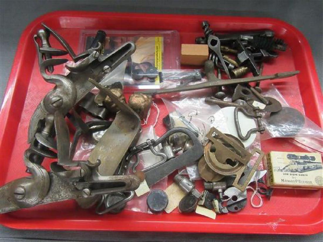Assorted Gun Parts Lot: A compiled grouping of various gun parts. As seen in photograph preview.