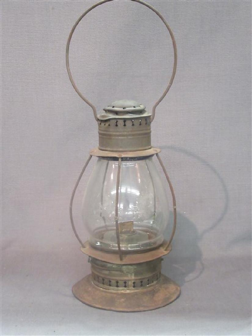 P.R.R. Railroad Lantern: Pennsylvania Railroad lantern. Embossed globe PRR. Dimensions: 16" X 8" approx.