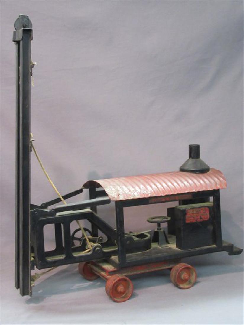 Buddy L Pile Driver: Buddy L Pile Driver. Original paint. Heavy steel toy. Dimensions: 23" X 19" X 7"