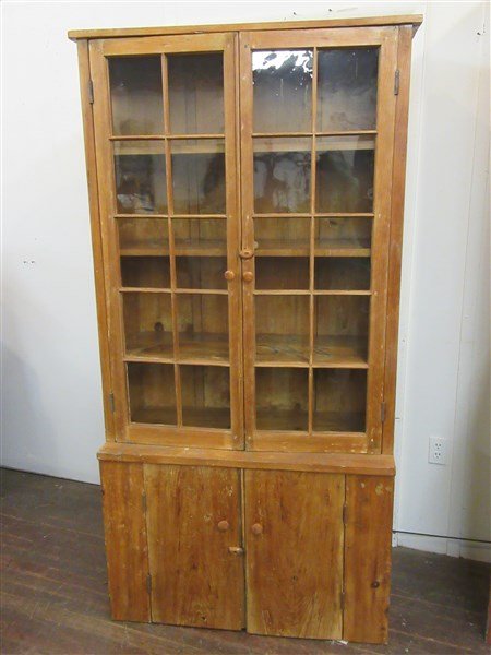 19th c. Pine Wavy Glass Cupboard, Accord, NY: A 19th century pine cupboard with original wavy glass panes. Parially made from pine shipping crates. S.C. Markle, Accord NY. Dimensions: 71" X 38" X 19"