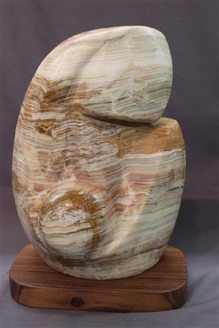 Lilly M. Tussey, Mother and Child Onyx Sculpture: Lily M. Tussey (American) Titled: Mother and Child Medium: Onyx Dimensions 15 1/2" X6 3/4" X 10 1/2" Provenance: Estate of Wassil Tussusov, New York, New York Husband of Lilly.