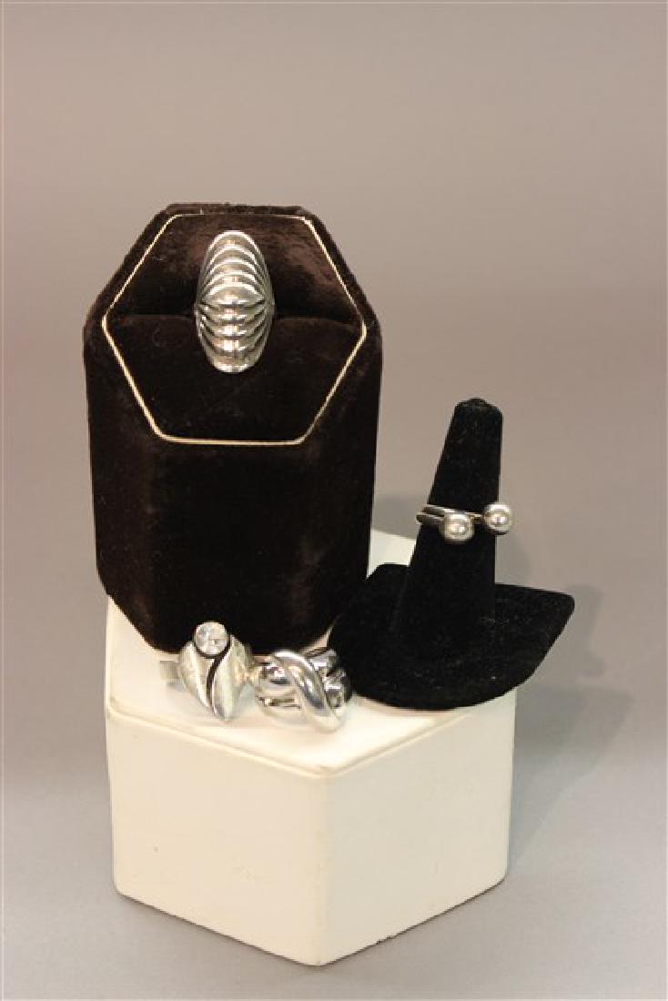 Four (4) Scandinavian Modernist Sterling Silver Rings: Four (4) Scandinavian vintage modernist design sterling silver rings. Various makers. Sizes 7-8