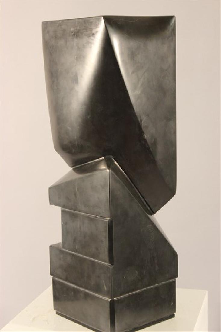 Lilly M. Tussey, Pilar Of Wisdom: Lily M. Tussey (Bulgarian/American d.2005)) Titled: Pilar Of Wisdom Material: Black marble Dimensions: 19 1/4"h X 6 1/4"L X 5 3/4"d Provenance: Estate of Wassil Tussusov, New York, New York Husband of
