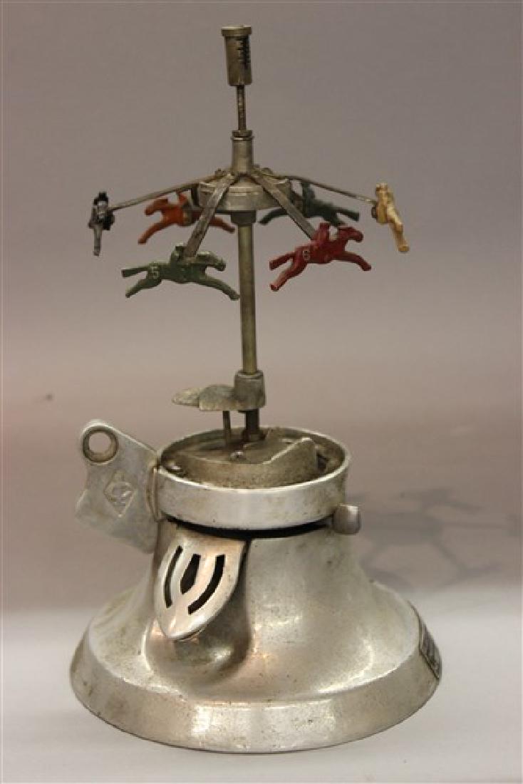 R.D. Simpson Derby Horse Race 1c Gumball Machine: R.D. Simpson Derby gumball vending machine. As seen. Missing globe and unknown operation. Attic find. Dimensions: 15" X 8"