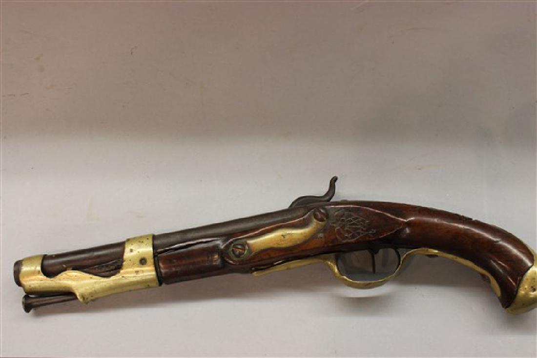 Napoleonic French Antique Pistol Percussion Conversion: Napoleonic french antique pistol percussion conversion with wood carved numbers inscribed. Dimensions: 15 1/2" L