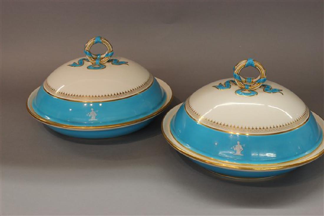 Minton Turquoise Blue Pat Sur Pate Covered Bowls: An Antique c.1893 set of Minton turquoise blue and white porcelain dinnerware round covered serving bowls. Signed Minton's China T. Goode & Co. London. A most fine silhouette figure of a nobleman with
