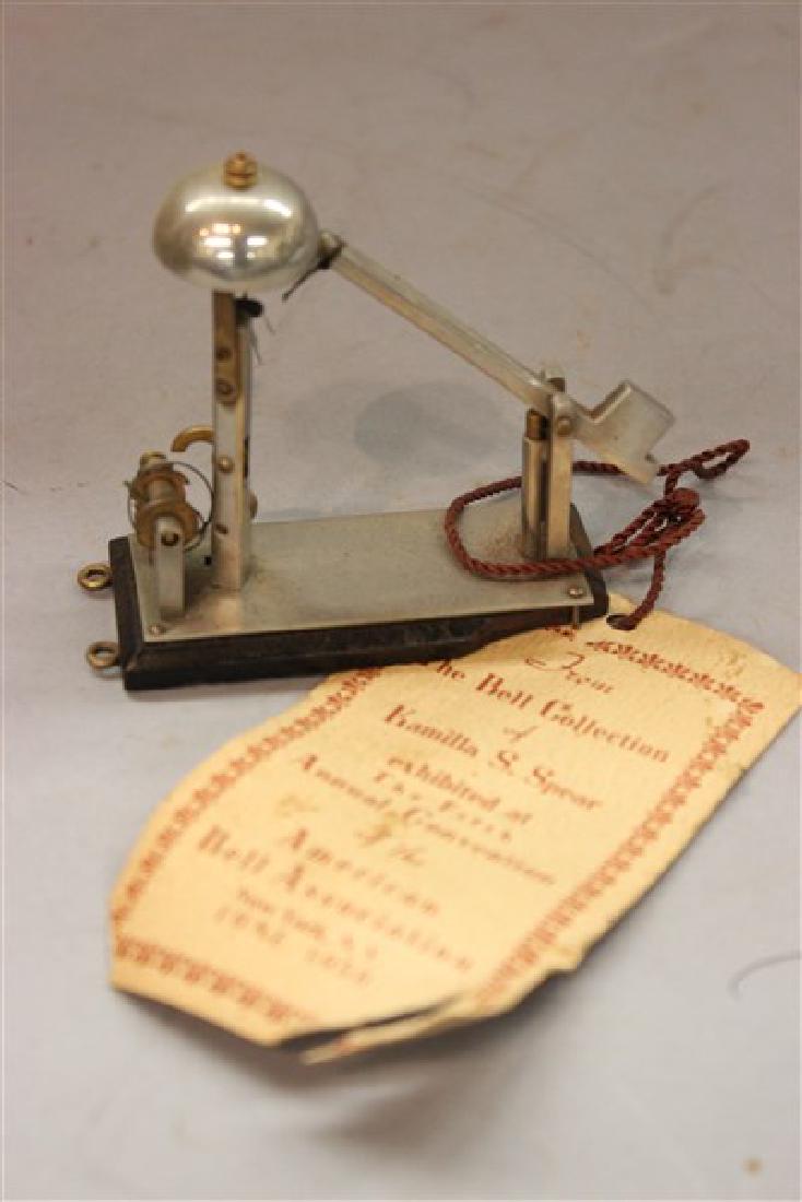 Early Miniature Bell Protype Model: An early miniature bell prototype model. Late 19th century. Dimensions: 3" X 3" X 1" A card attached The Bell Collection of Kamilla S. Spear exhibited at the Fifth ave. Convention of the American Bell