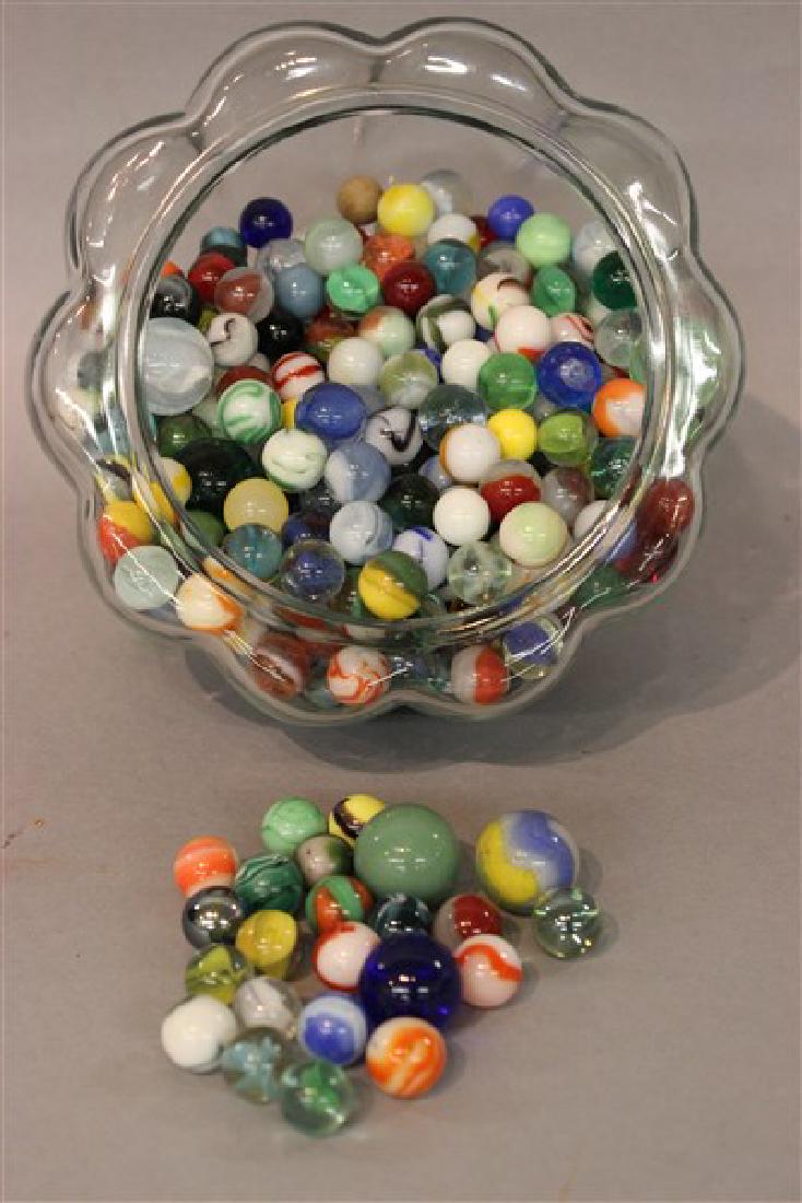 Estate Found Marbles Lot: A compiled grouping of estate found marbles. As seen in photograph preview.