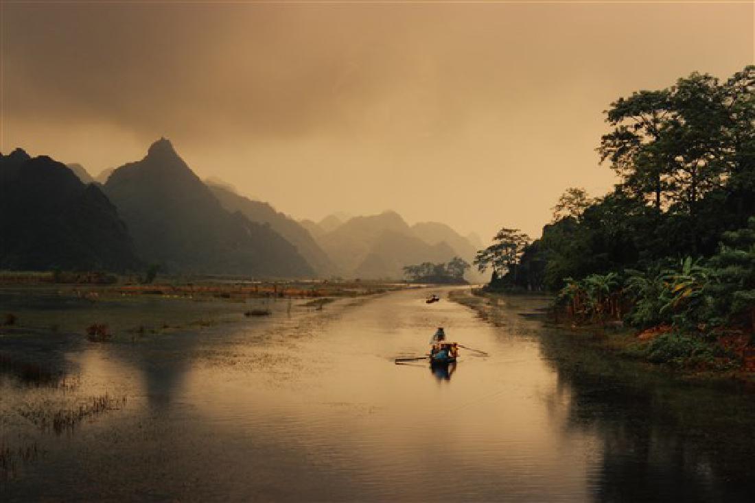 Mitch Epstein, (American b.1952) Perfume Pagoda Canal: Artist: Mitch Epstein (American, b. 1952) Titled: Perfume Pagoda Canal, Vietnam1994 Chromogenic printPresumably signed, dated and numbered 10/10 on the reverse.Dimensions: 20" X 30" and matted in ebon