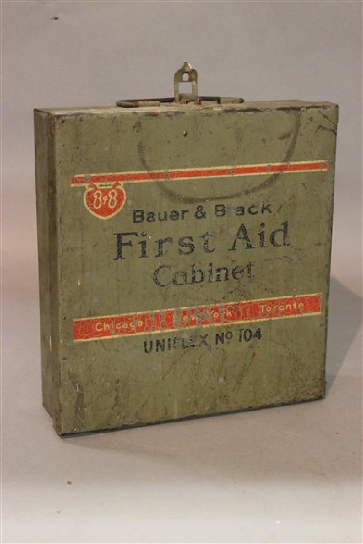 Vintage Bauer & Black First Aid Cabinet: A vintage Bauer & Black first aid cabinet kit. The Uniflex No 104 with contents. From the Terhune City Pharmacy, Middetown, NYDimensions: 9 1/2" X 8 3/4"