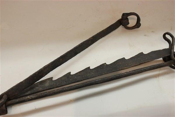 Primitive Fireplace Trammel: An early antique iron fireplace trammel. Dimensions: 20" X 5" condensed.