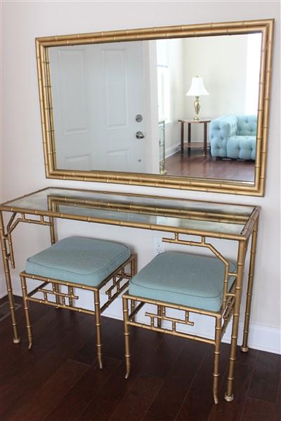 Bamboo Vanity w/ Mirror and Two Seats: A Hollywood Regency style vintage faux bamboo glass not vanity dressing table with Two (2) matching seats with blue upholstered cushioning along with a mirror to match. Dimensions: 31"h X 48" X 18 1/2