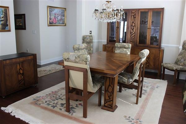 United Furniture Mid Century Dining room Set: United Furniture brutalist style of Paul Evans Dining room suite including an impressive Two (2) piece breakfront, dining table with Six (6) chairs and bar. Walnut hardwood with Tahitian like carving.