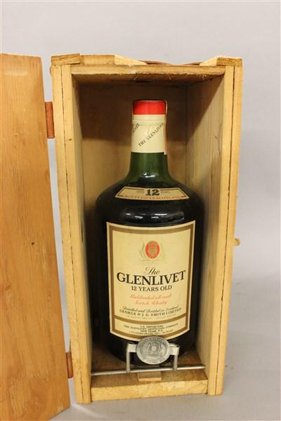 Glenlivet 12 Years: Glenlivet 1.75L 12 years aged. Sealed with original crate with leather hinges. Dimensions: 15" X 7" X 7"