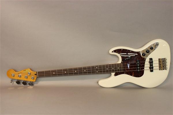 Fender Squier Electric Guitar: Fender Squier electric guitar. Jazz base. 46" length Serial no. CGS1214269