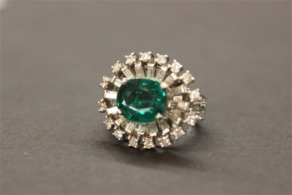 18k w.g. Emerald Dublet And Diamond Ring w/ Tiffany App: An 18k white gold Emerald doublet and diamond ring with Tiffany appraisal dated March 31,1960."Diamond and doublet emerald ring, double emerald weighing 4.08 carats, 16 baguette diamonds .83 carat, 40