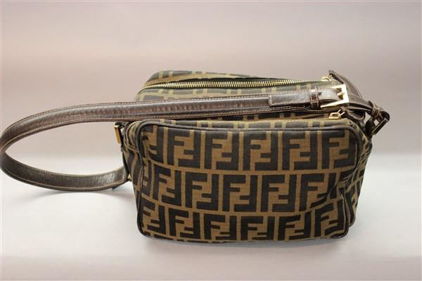 Fendi Zucca Canvas Shoulder Hand Bag: A Fendi Zucca canvas shoulder hand bag. Double zipper closure with leather pull handle. Good condition with slight detachment of strap handle where it is attached to bag. Needs some stitching eventual