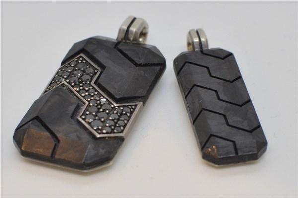 Two (2) David Yurman Forged Carbon Diamond Pendants: Two David Yurman pendants. Forged carbon with black diamonds signed 2" X 1/2" and forged carbon smaller pendant 1 3/4" X 1/2" Total weight: 1 avg.oz.