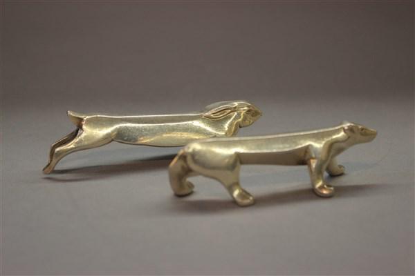 Gallia-Christofle Silver Plated Knife Rests: Two Christofle Gallia silver plated figural animal knife rests. Dog and bear. Dimensions: 3 1/2" Lengths