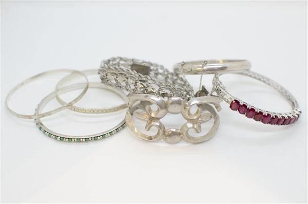 Assorted Sterling Silver Estate Bracelet Lot: A compiled grouping of Seven (7) bracelets. Cuffs, turquoise beaded, bangles etc. Total weight: 4.6 avg. oz.