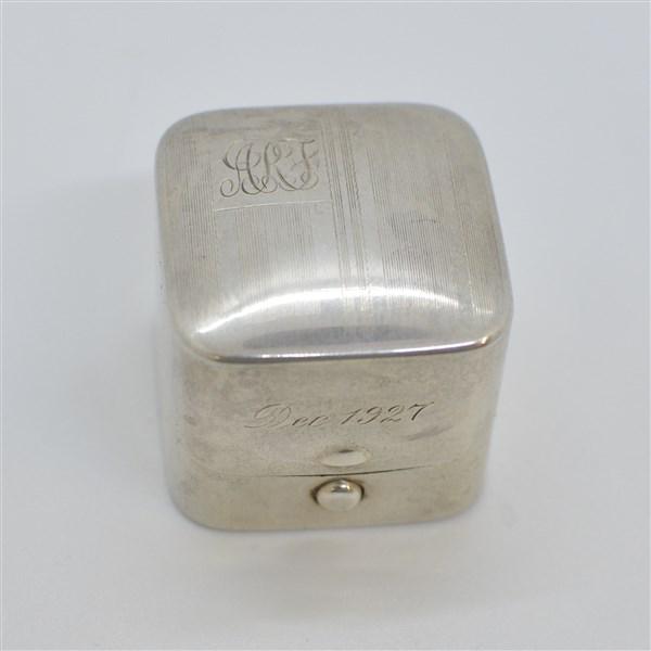 1920's Sterling Silver Engagement Ring Box: A 1920's inscribed sterling silver ring presentation box made by Sturdy. Dimensions: 1 3/4" X 1 3/4" Total weight: 1 avg. oz.