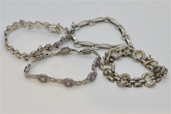 Estate Sterling Silver Bracelet Lot: A compiled grouping of estate sterling silver bracelets. Four bracelets including Italian wide link bracelets and amethyst gemstone bracelet. 7 1/2" lengthsTotal weight:2.34 troy ounces