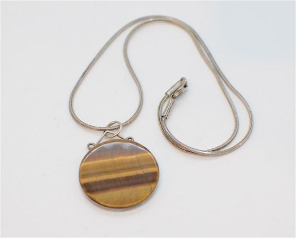Sterling Silver Cat's Eye Necklace Pendant: A sterling silver cat's eye necklace pendant. Dimensions: 1 1/4"d 8 1/2" drop Total weight: 15.9 grams