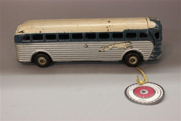 Arcade Greyhound Cast Iron Toy Bus: Arcade Greyhound cast iron toy bus. Dimensions: 3"h X 9"L