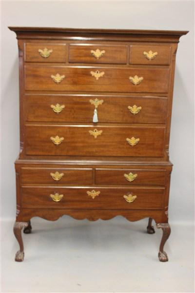 Mahogany Highboy: A mahogany highboy chest. Mid 20th century. Dimensions: 66"h X 46"w X 21"