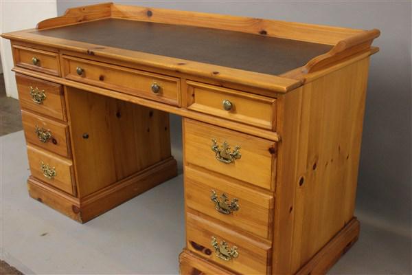 Knotty Pine Office Desk: A knotty pine country style office desk. Dimensions: 33"h X 54"L X 24"d