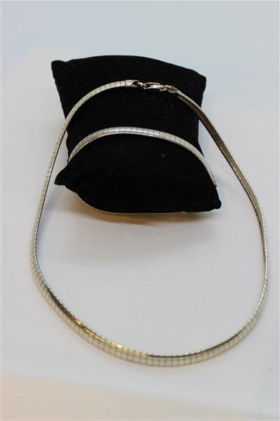 80's Sterling Silver Choker Necklace And Bracelet: A 1980's style sterling silver choker necklace and bracelet set. Dimensions: 15" length and 7" bracelet Total weight: 1.77 troy ounces