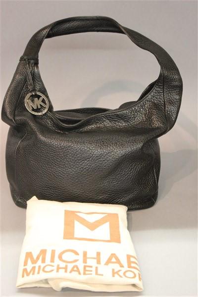Michael Kors Black Pebble Leather Handbag: Michael Kors black pebble leather handbag. Bucket bag style. Dimensions: 10" X 15" body only and 10" strap drop.