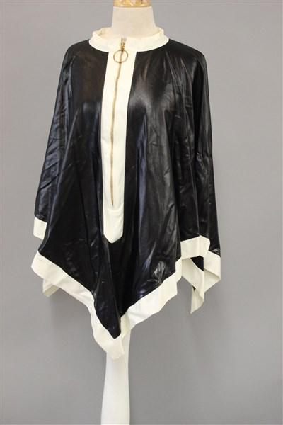 Vintage 80's Oscar De La Renta Swimsuit Coverup: A vintage 1980's Oscar De La Renta sexy black and white swimsuit cover up. Thick soft and sleek satin type material. Dimensions: 25" drop